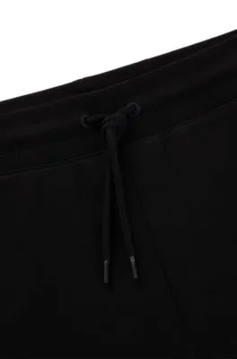 Cotton-terry tracksuit bottoms with logo trim